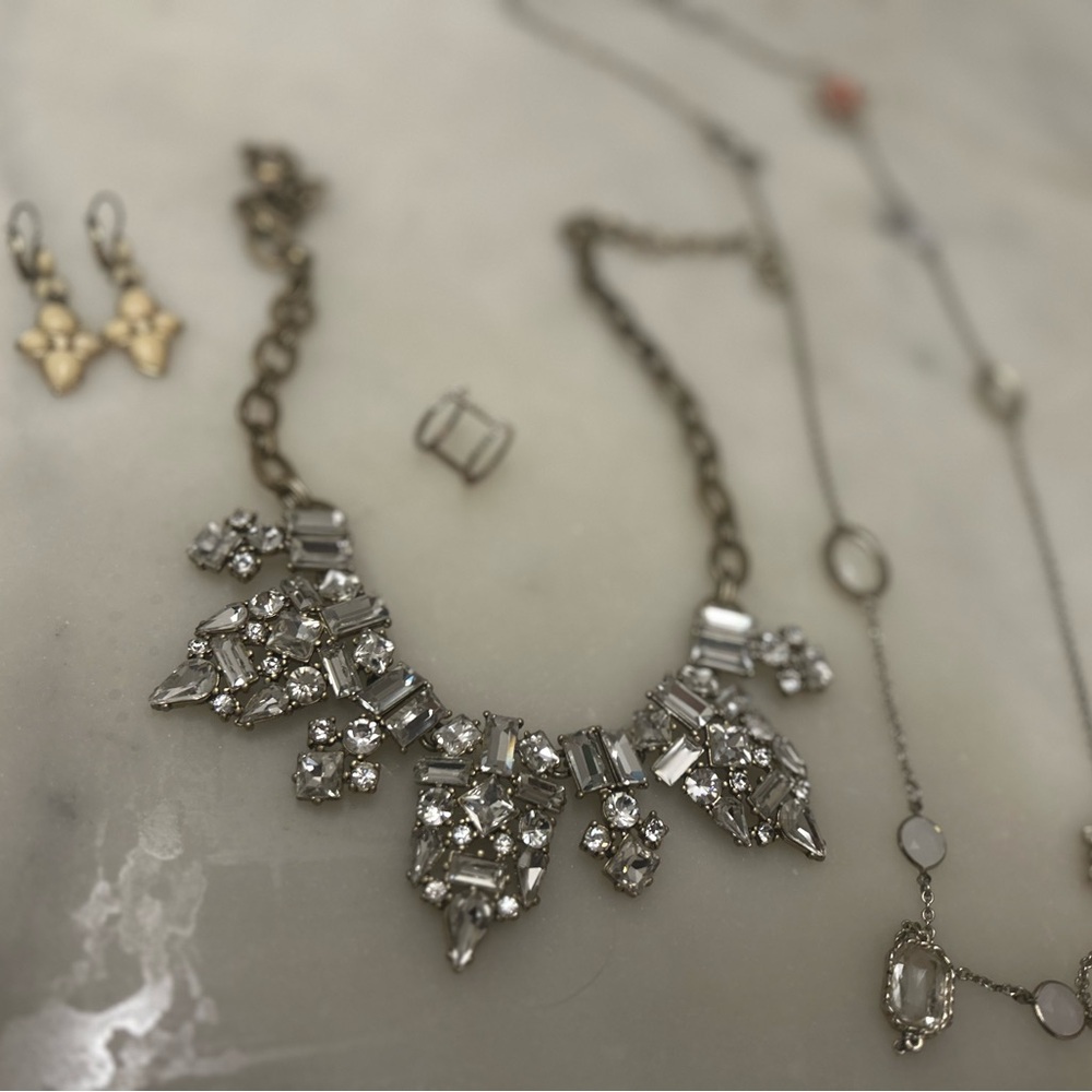 Collection of jewelry. Earrings, necklaces and ring.